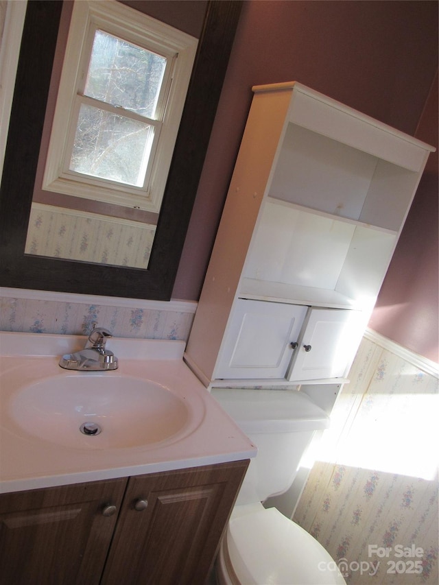 bathroom with vanity and toilet