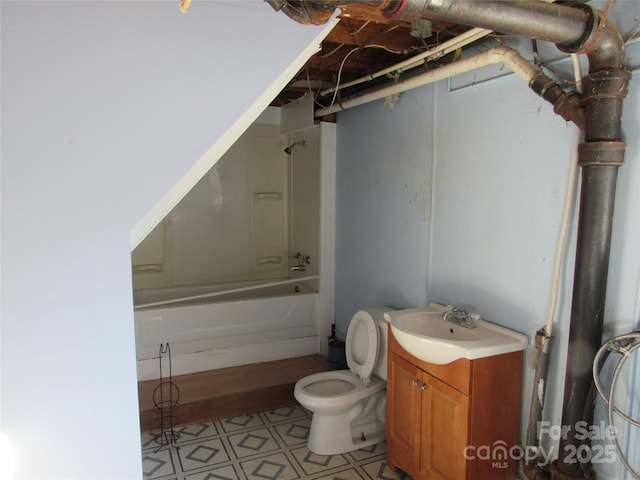 full bathroom with vanity, bathing tub / shower combination, and toilet