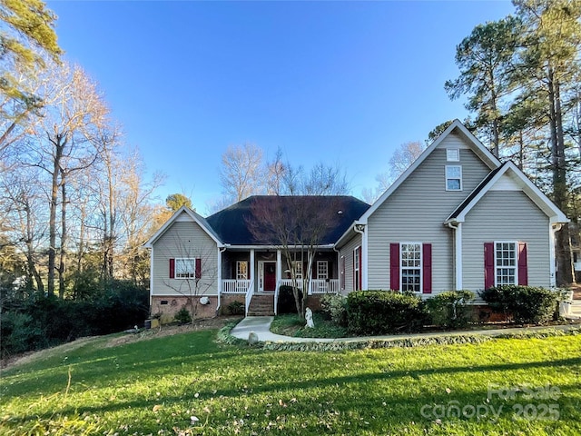 view of front of property featuring covered porch and a front yard