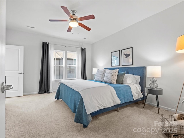 carpeted bedroom featuring ceiling fan