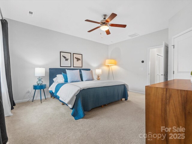 carpeted bedroom featuring ceiling fan