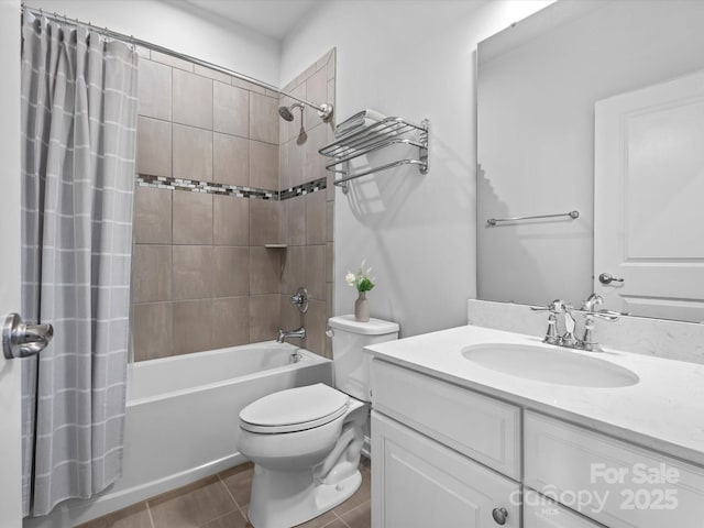 full bathroom with toilet, tile patterned floors, vanity, and shower / tub combo with curtain