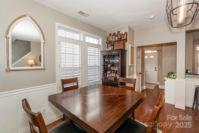 dining room featuring dark hardwood / wood-style floors