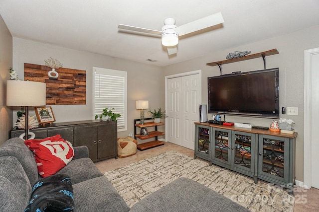 living room with ceiling fan