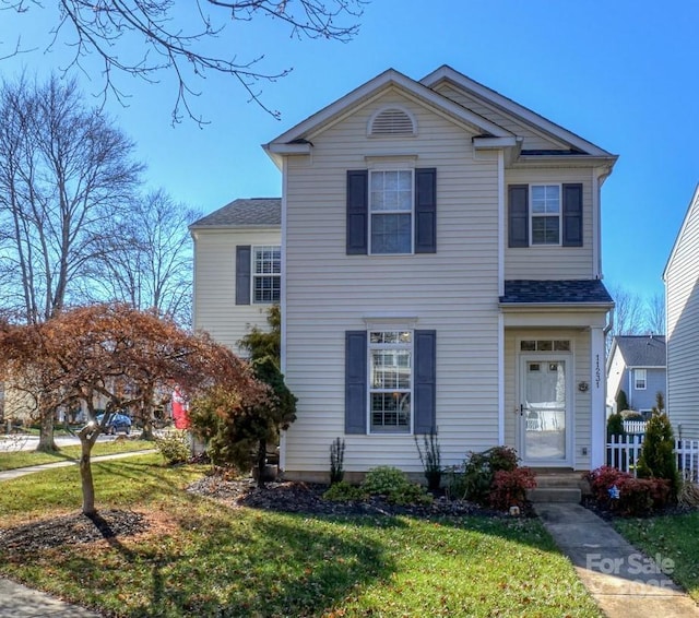 view of front facade with a front lawn