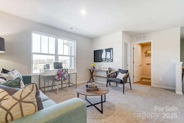 living room with light colored carpet