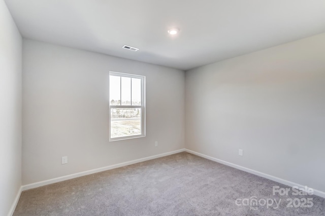 view of carpeted spare room