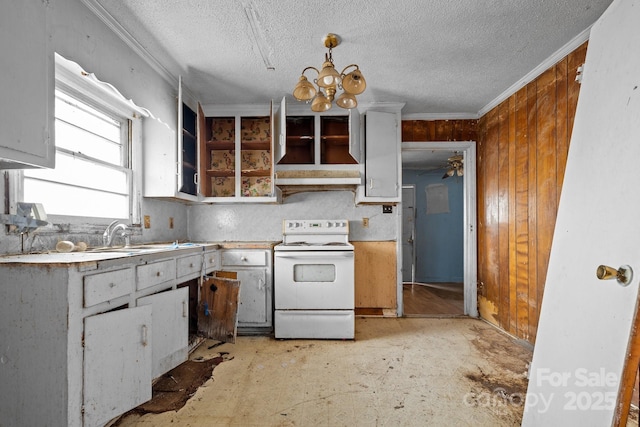 kitchen featuring sink, a textured ceiling, a notable chandelier, ornamental molding, and white electric range