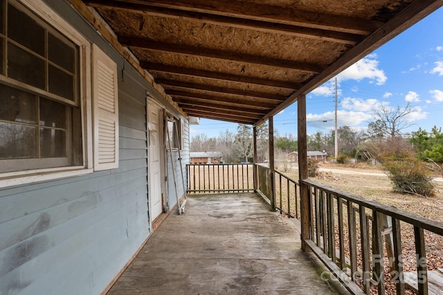 balcony featuring a porch