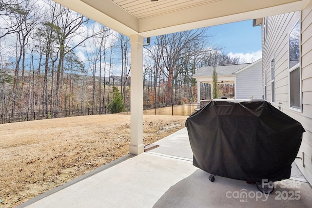 view of patio / terrace with fence and grilling area