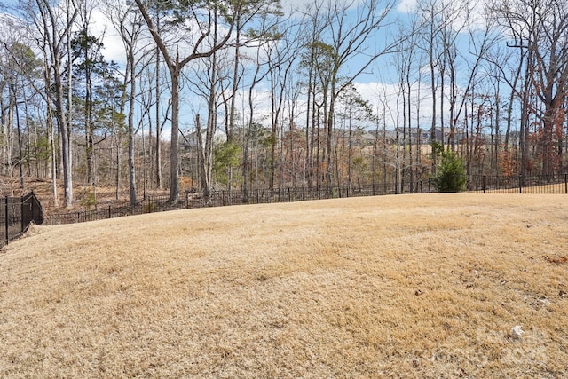 view of yard featuring fence