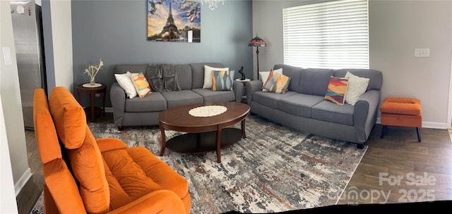 living room featuring dark hardwood / wood-style flooring