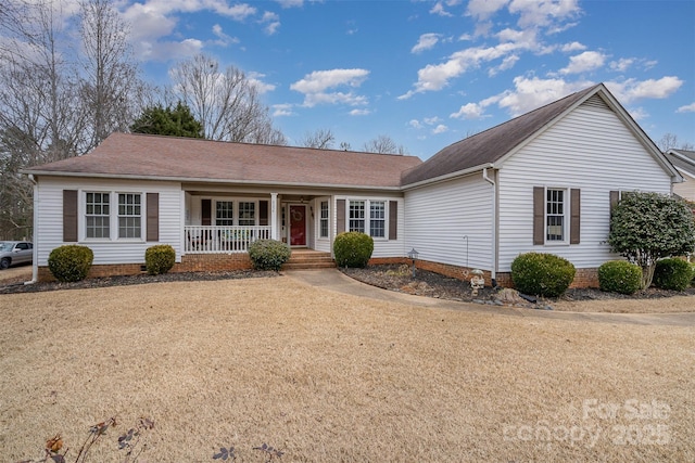 single story home featuring covered porch