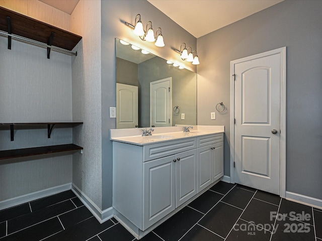 bathroom with vanity and tile patterned flooring