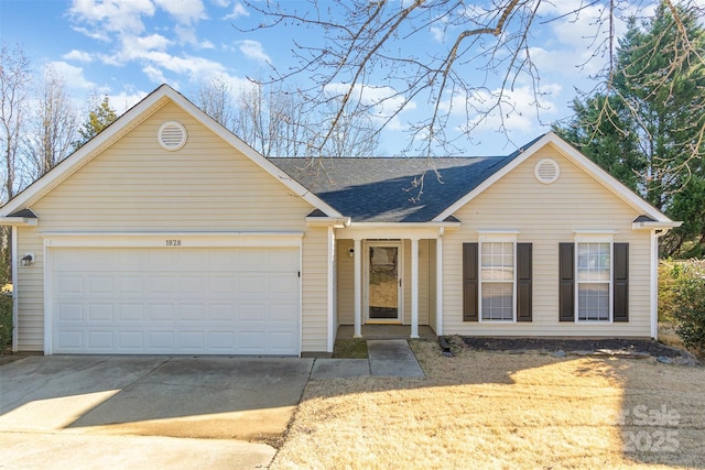 single story home featuring a garage