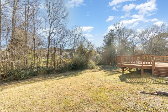 view of yard with a deck