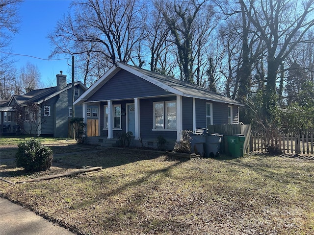 ranch-style house with a front yard