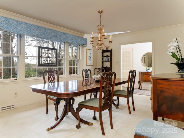 carpeted dining area with an inviting chandelier, crown molding, and plenty of natural light