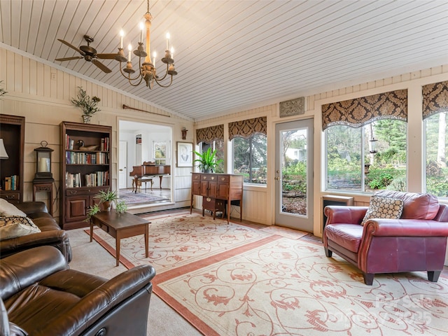 interior space featuring ceiling fan with notable chandelier, vaulted ceiling, and wooden ceiling