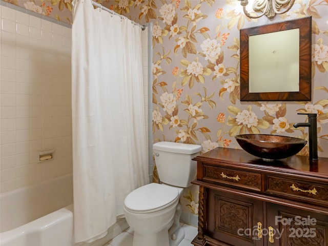 full bathroom featuring toilet, shower / bath combo, and vanity