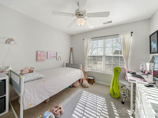 bedroom with ceiling fan and carpet flooring