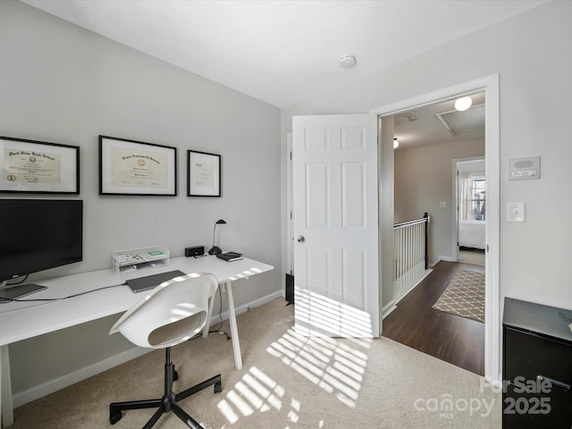 office with carpet flooring and lofted ceiling