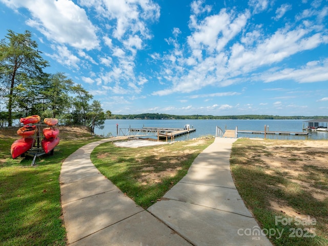 dock area featuring a water view