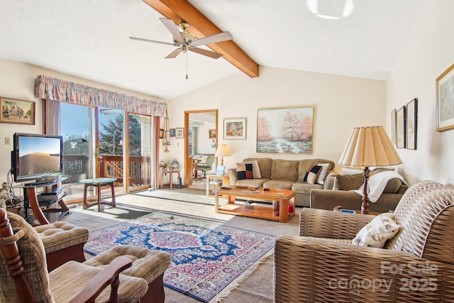 carpeted living room with ceiling fan and lofted ceiling with beams