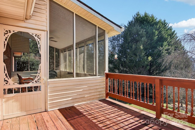 wooden terrace with a sunroom