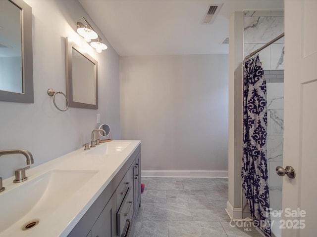 bathroom with vanity and a shower with shower curtain