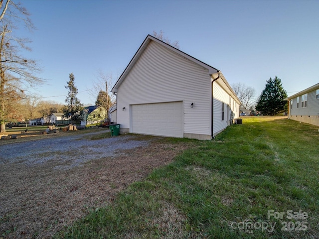 view of property exterior featuring a garage and a lawn