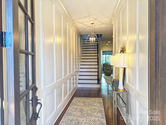 entrance foyer featuring a chandelier