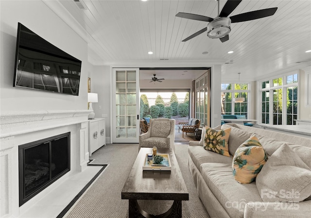 living room with french doors, light carpet, and wood ceiling