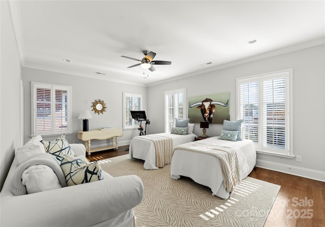 bedroom with ceiling fan, hardwood / wood-style flooring, and ornamental molding