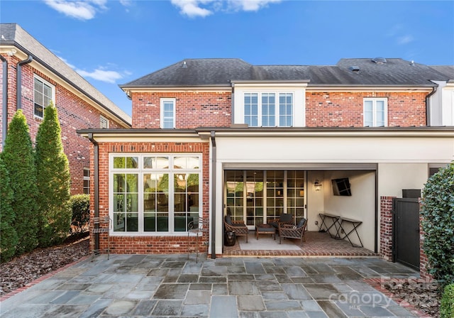 back of house featuring a patio