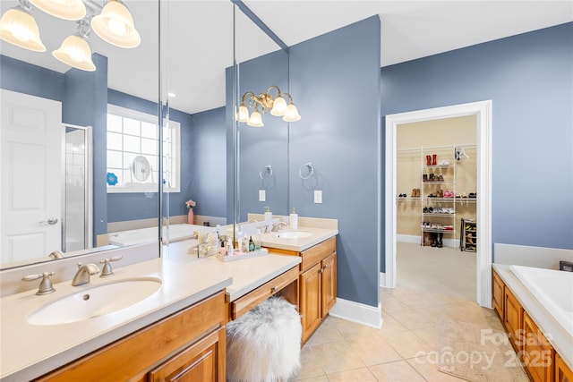 bathroom with vanity, independent shower and bath, and tile patterned flooring