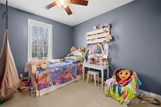 carpeted bedroom featuring ceiling fan