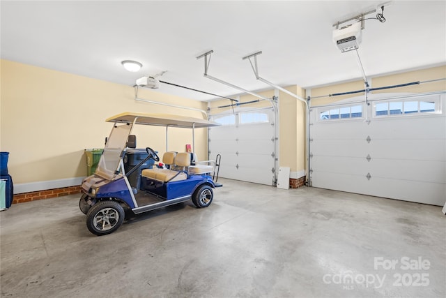 garage featuring a garage door opener