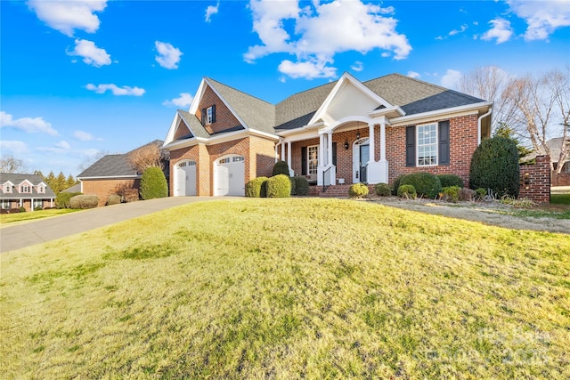 view of front of home with a garage and a front yard