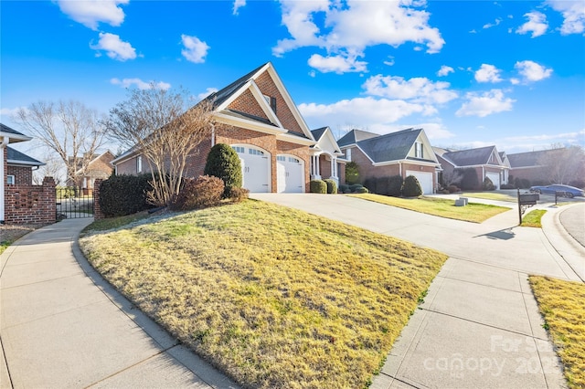 view of front of property with a front lawn and a garage