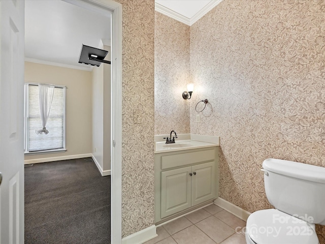 half bathroom featuring toilet, wallpapered walls, ornamental molding, and vanity