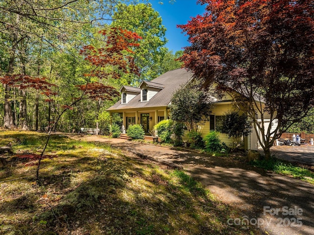 view of front of property featuring covered porch