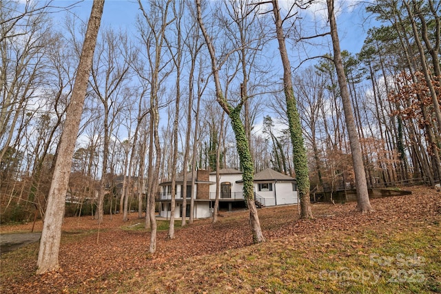 rear view of property with a deck