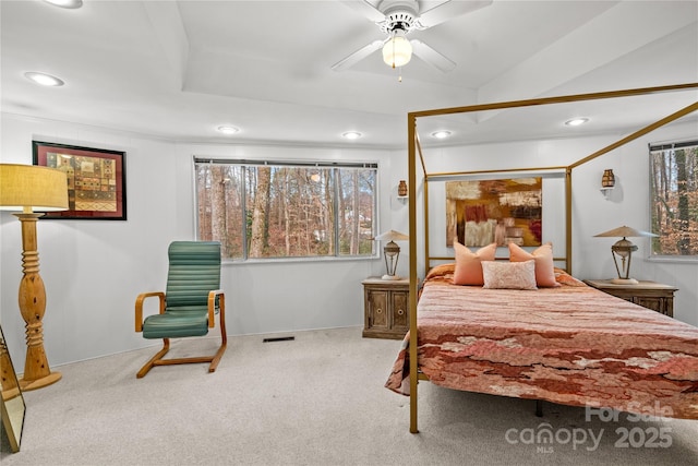 carpeted bedroom featuring ceiling fan