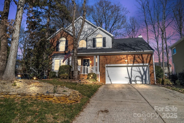 front facade featuring a porch and a garage