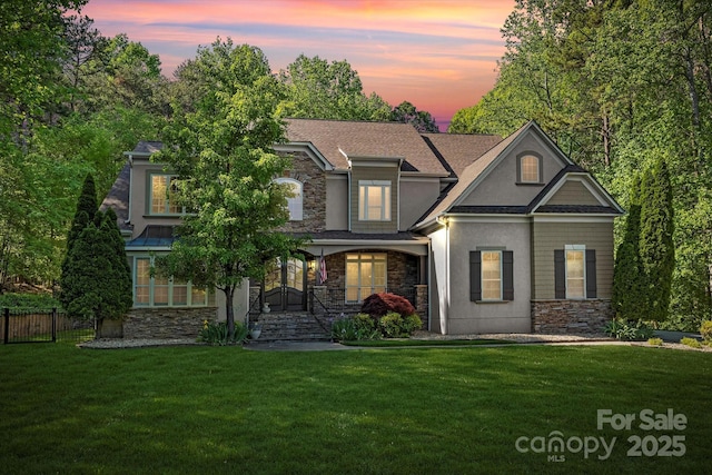 view of front of home featuring a yard