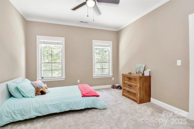 bedroom featuring multiple windows, ornamental molding, light colored carpet, and ceiling fan