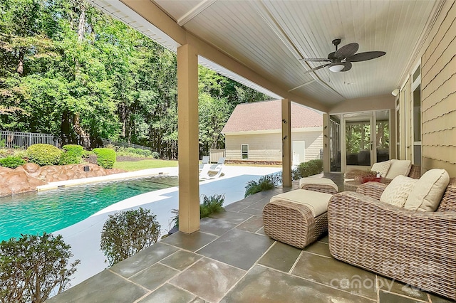 view of patio featuring outdoor lounge area and ceiling fan