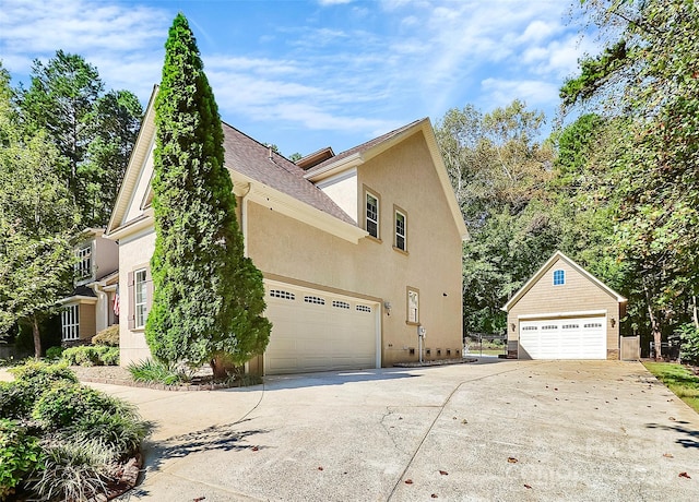 view of side of property featuring a garage