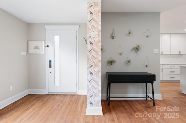 entrance foyer with light wood-type flooring